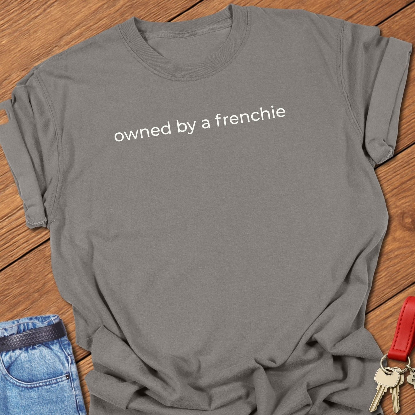 French bulldog owned by a frenchie text graphic printed on pepper Comfort Colors t shirt