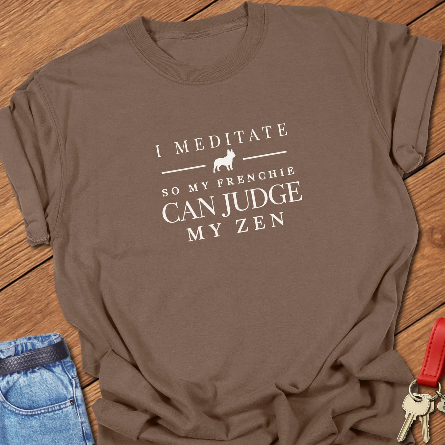 I Meditate So My Frenchie Can Judge My Zen text design featuring a French Bulldog silhouette on a Comfort Colors 1717 t shirt in Espresso color.