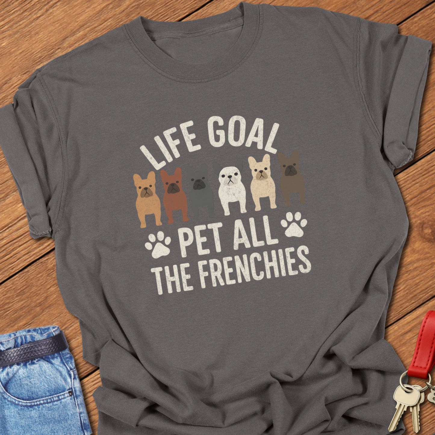 French bulldog pet lover illustration with multiple Frenchie graphics and life goal typography printed on pepper Comfort Colors t shirt