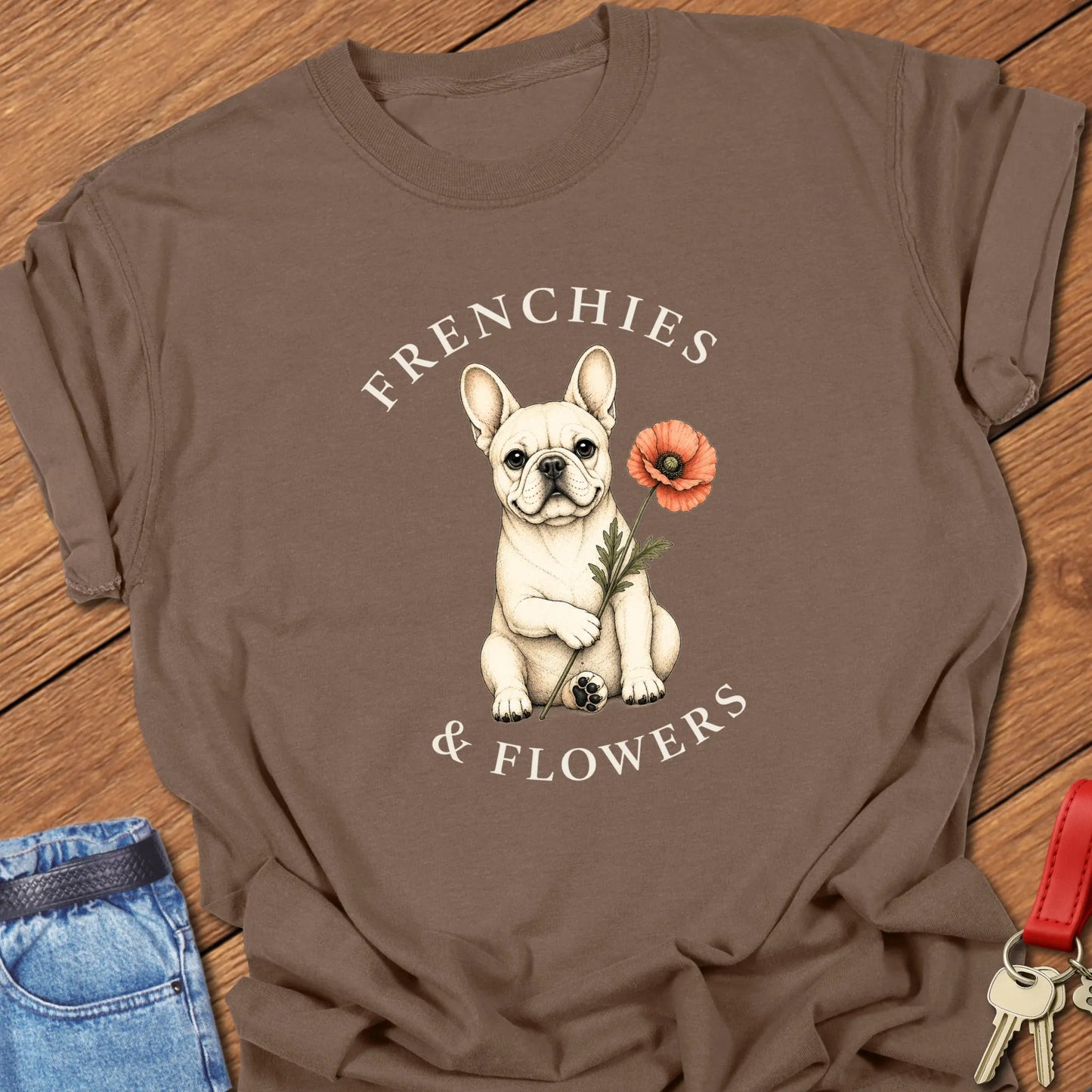 Frenchie Poppy botanical French Bulldog illustration with red poppy and Frenchies & Flowers typography printed on Comfort Colors® t-shirt in Espresso Color