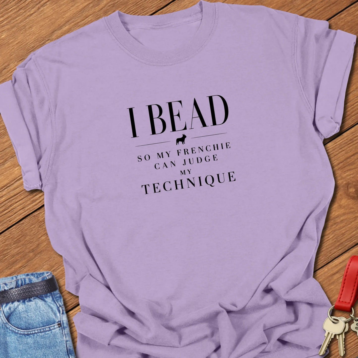 I Bead So My Frenchie Can Judge My Beading text design along with a French Bulldog silhouette on a Comfort Colors 1717 cotton t shirt in Orchid color.