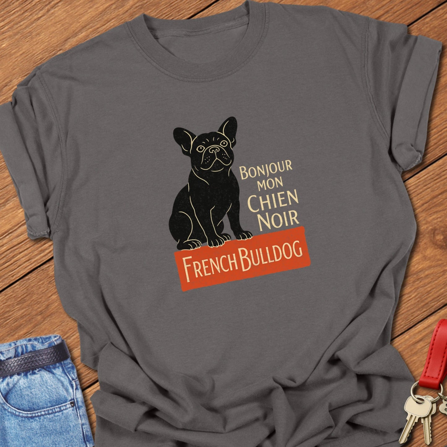 French bulldog vintage French typography illustration with black Frenchie graphic and Bonjour mon chien noir text printed on pepper Comfort Colors t shirt