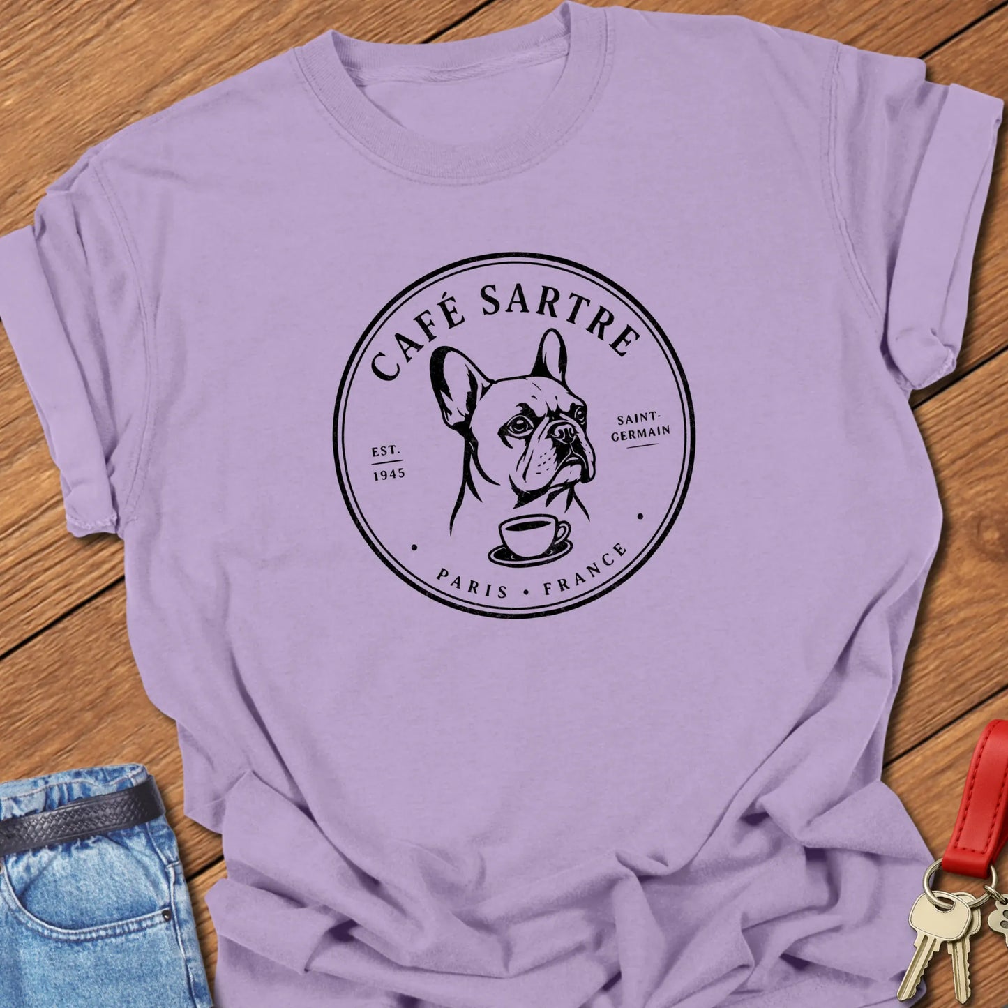 Café Sartre Paris French Bulldog graphic t-shirt featuring minimalist Saint-Germain café artwork and literary-inspired design in Orchid color.