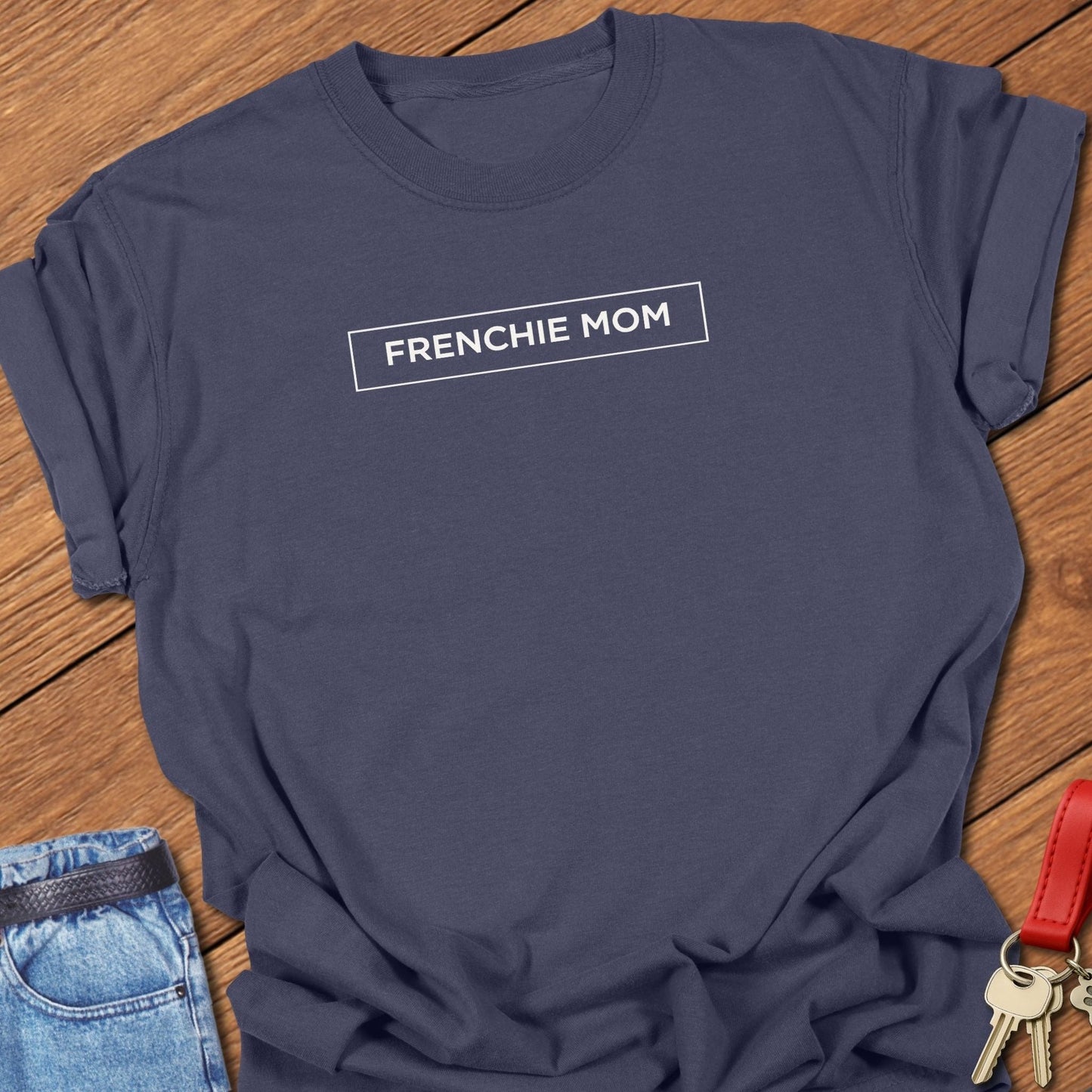 French bulldog frenchie mom text graphic printed on navy Comfort Colors t shirt.
