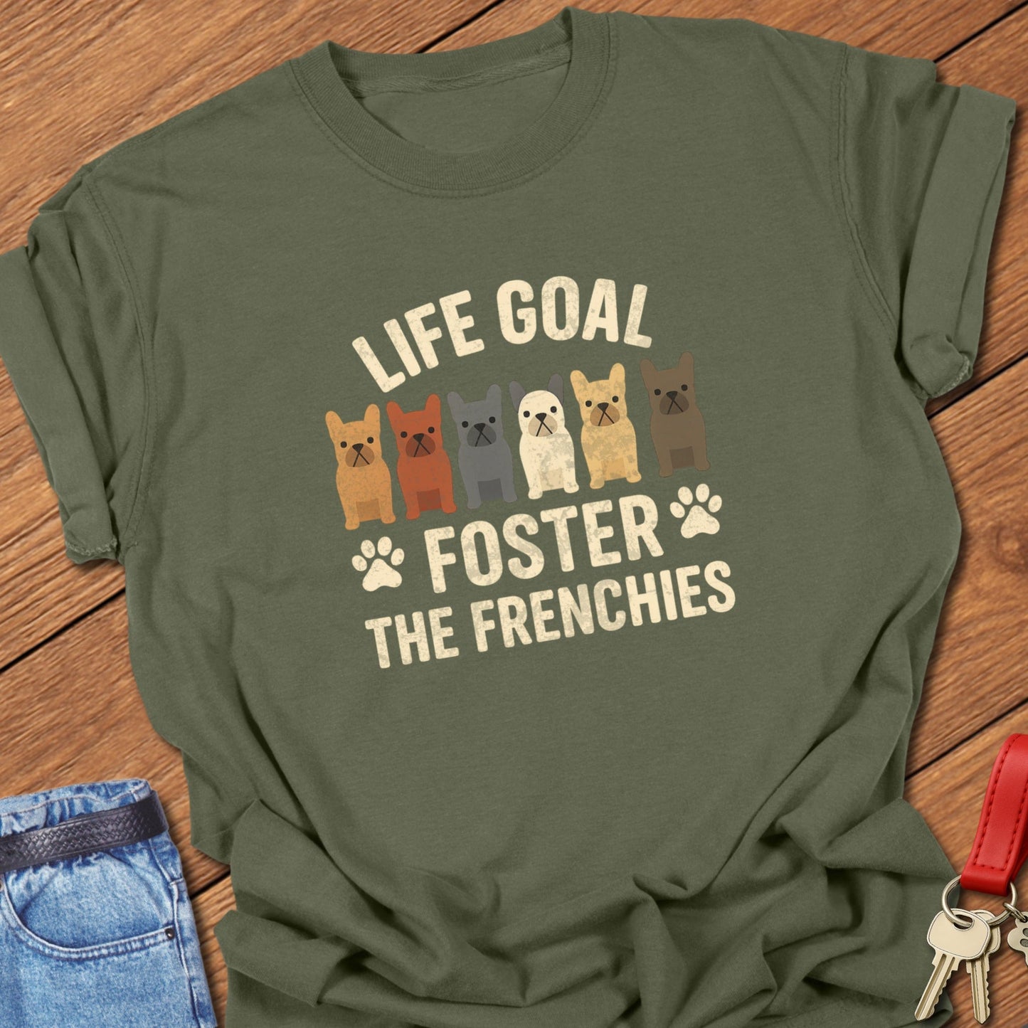 French bulldog foster illustration with multiple Frenchie graphics and bold life goal typography printed on hemp Comfort Colors t shirt