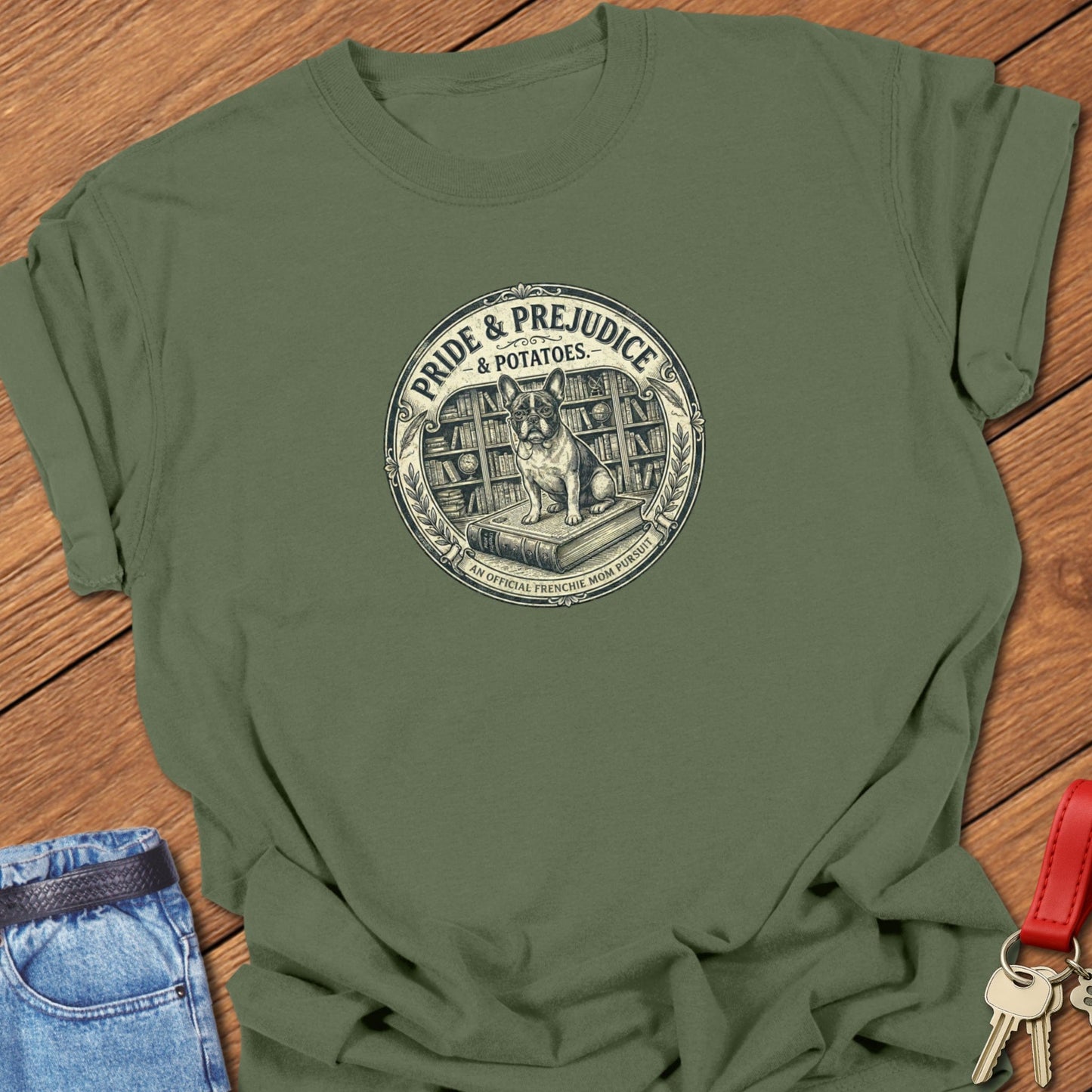 French bulldog vintage book-style “Pride & Prejudice & Potatoes” illustration printed on moss Comfort Colors t shirt