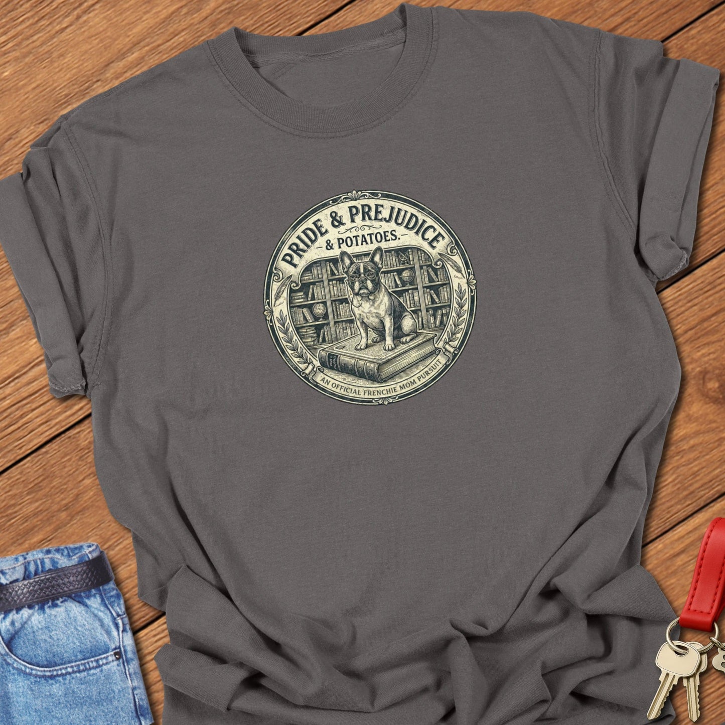 French bulldog vintage book-style “Pride & Prejudice & Potatoes” illustration printed on pepper Comfort Colors t shirt