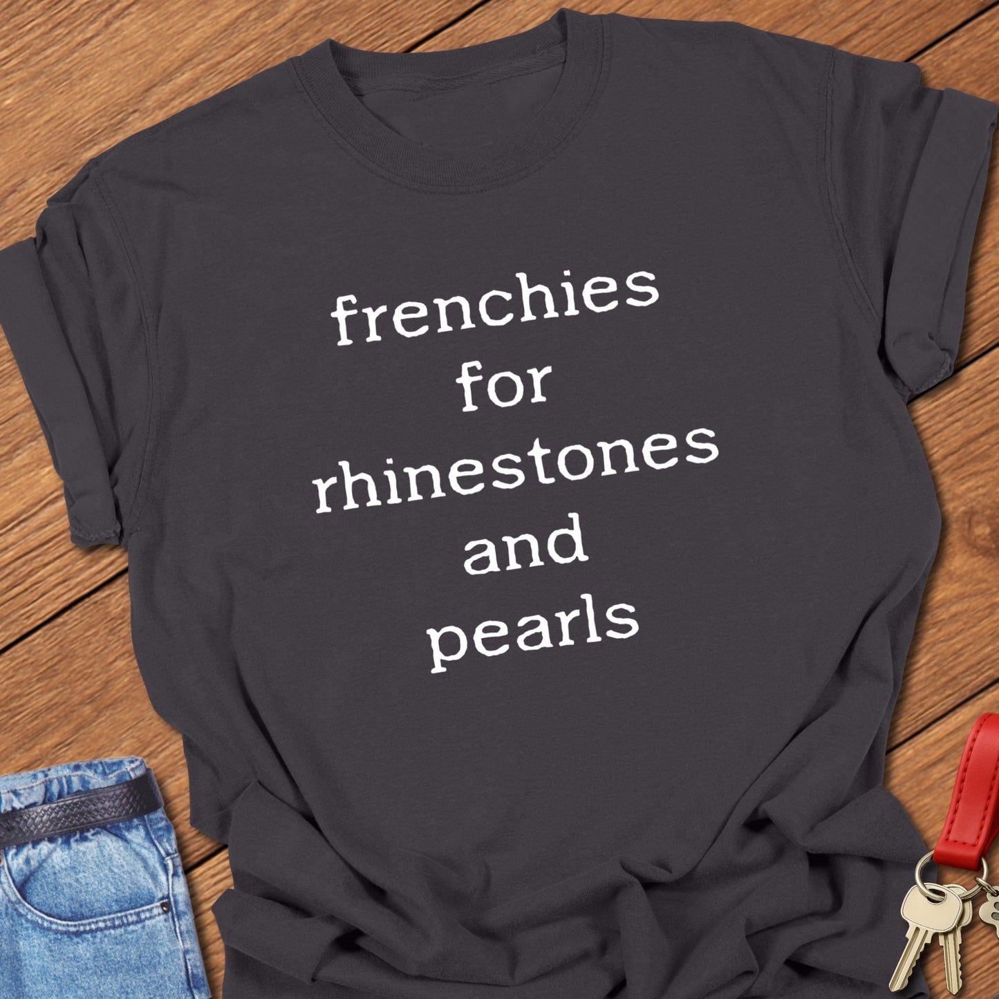 French bulldog typography quote design reading “frenchies for rhinestones and pearls” printed on graphite Comfort Colors t shirt