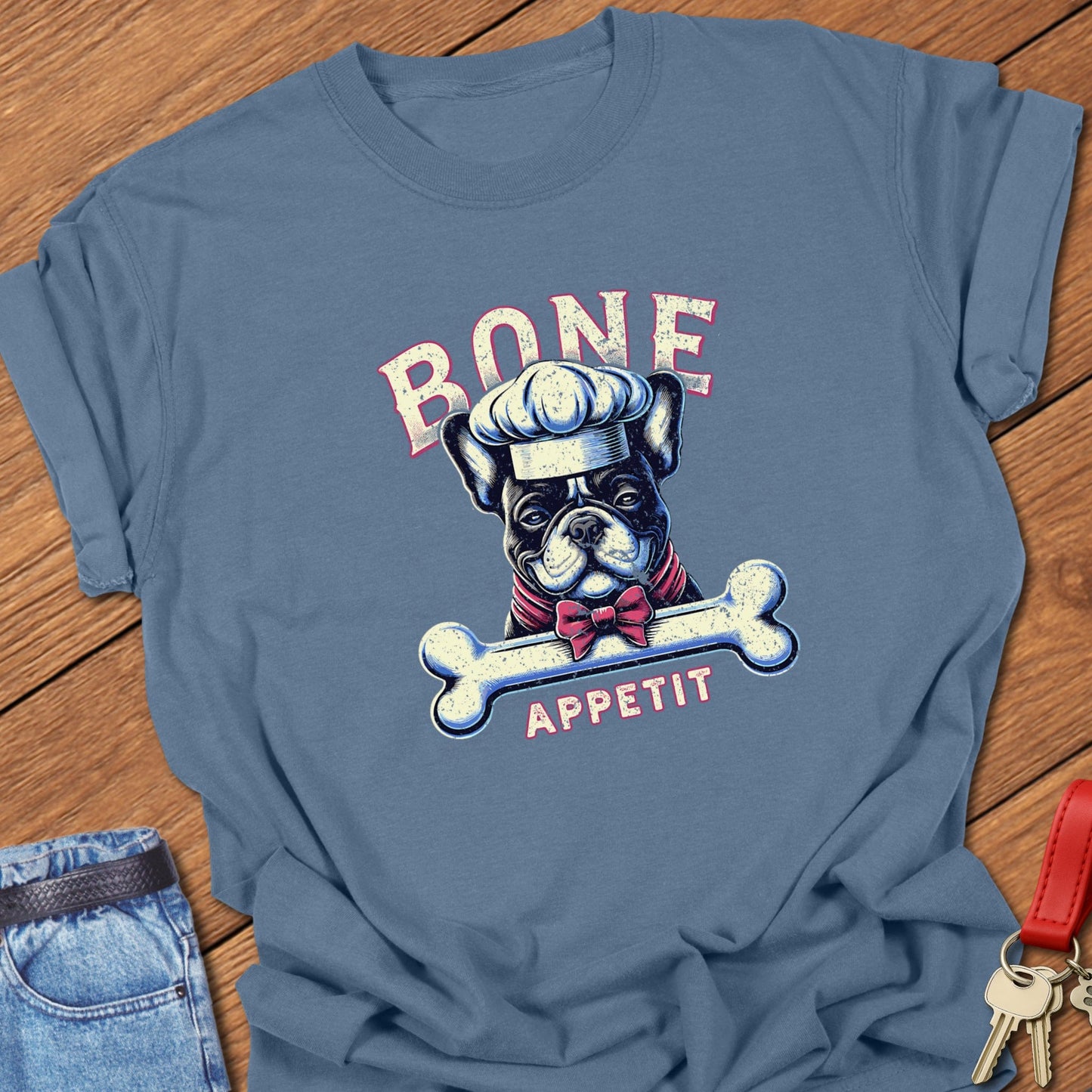 French bulldog chef with bone “Bone Appetit” design printed on blue jean Comfort Colors t shirt