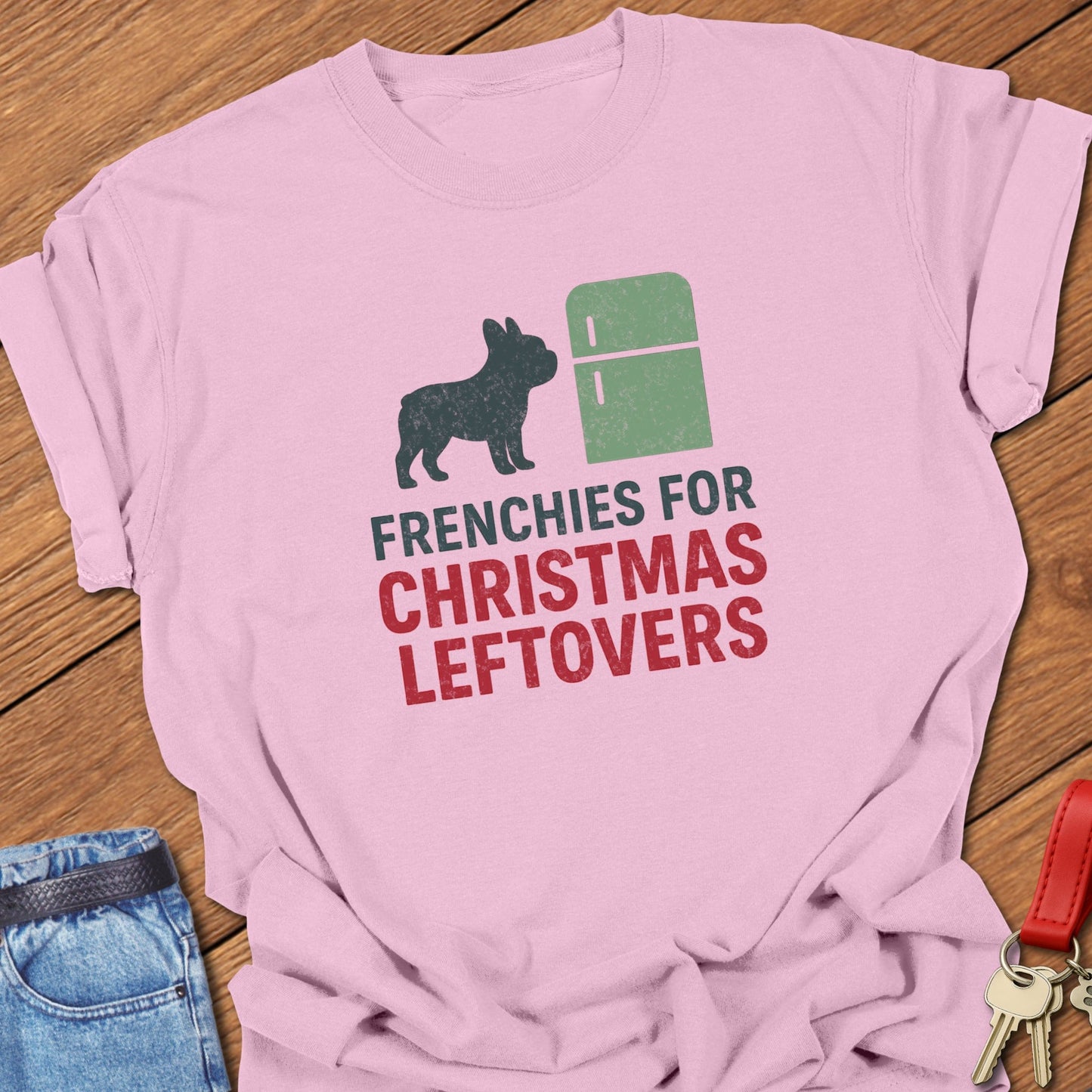 French bulldog humorous Christmas leftovers illustration with fridge graphic and festive typography printed on blue jean Comfort Colors t shirt