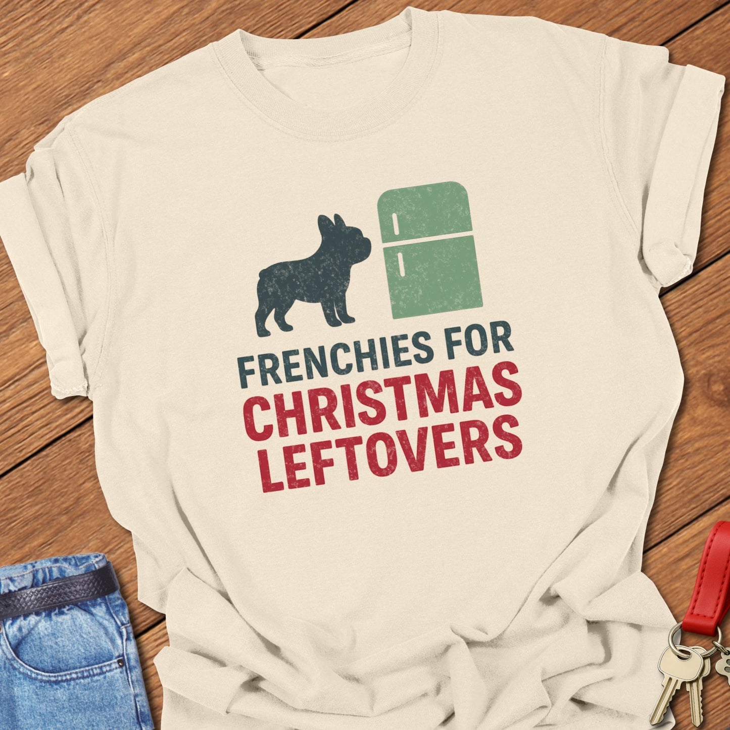 French bulldog humorous Christmas leftovers illustration with fridge graphic and festive typography printed on blossom Comfort Colors t shirt