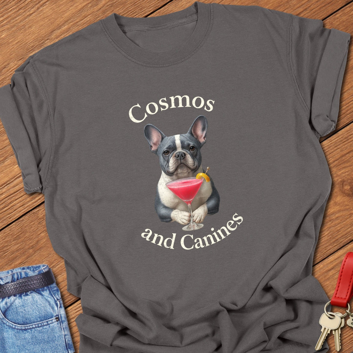 French bulldog cocktail illustration with cosmopolitan martini glass and playful typography printed on pepper Comfort Colors t shirt