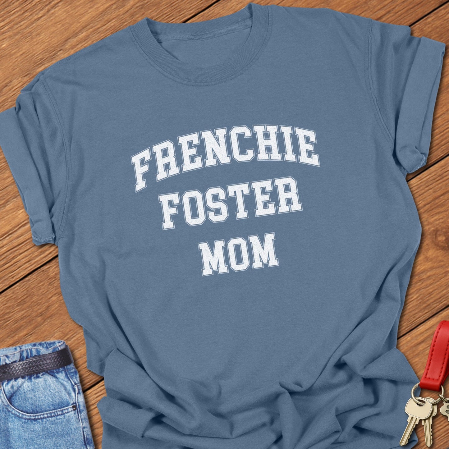 French bulldog foster mom varsity-style distressed typography printed on blue jean Comfort Colors t shirt