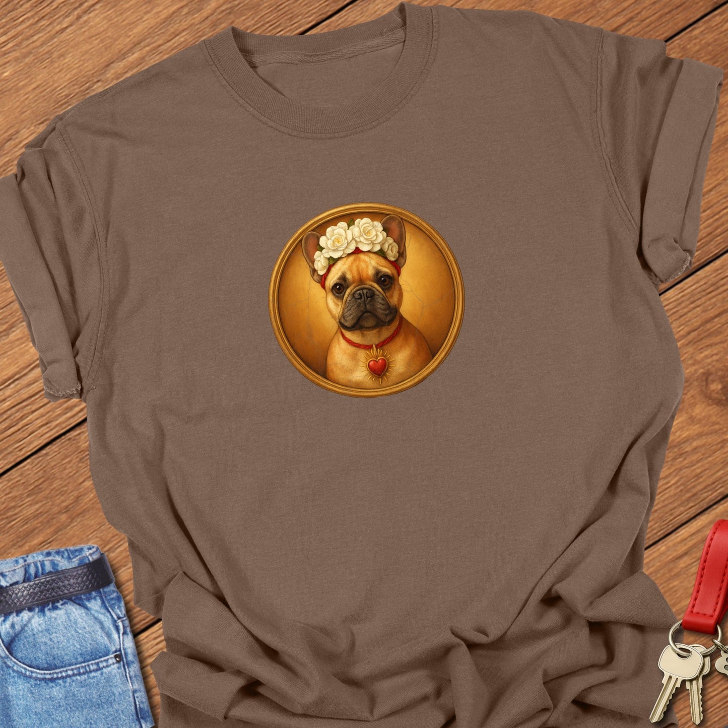French bulldog vintage portrait medallion design with a floral crown and heart detail printed on navy Comfort Colors t shirt