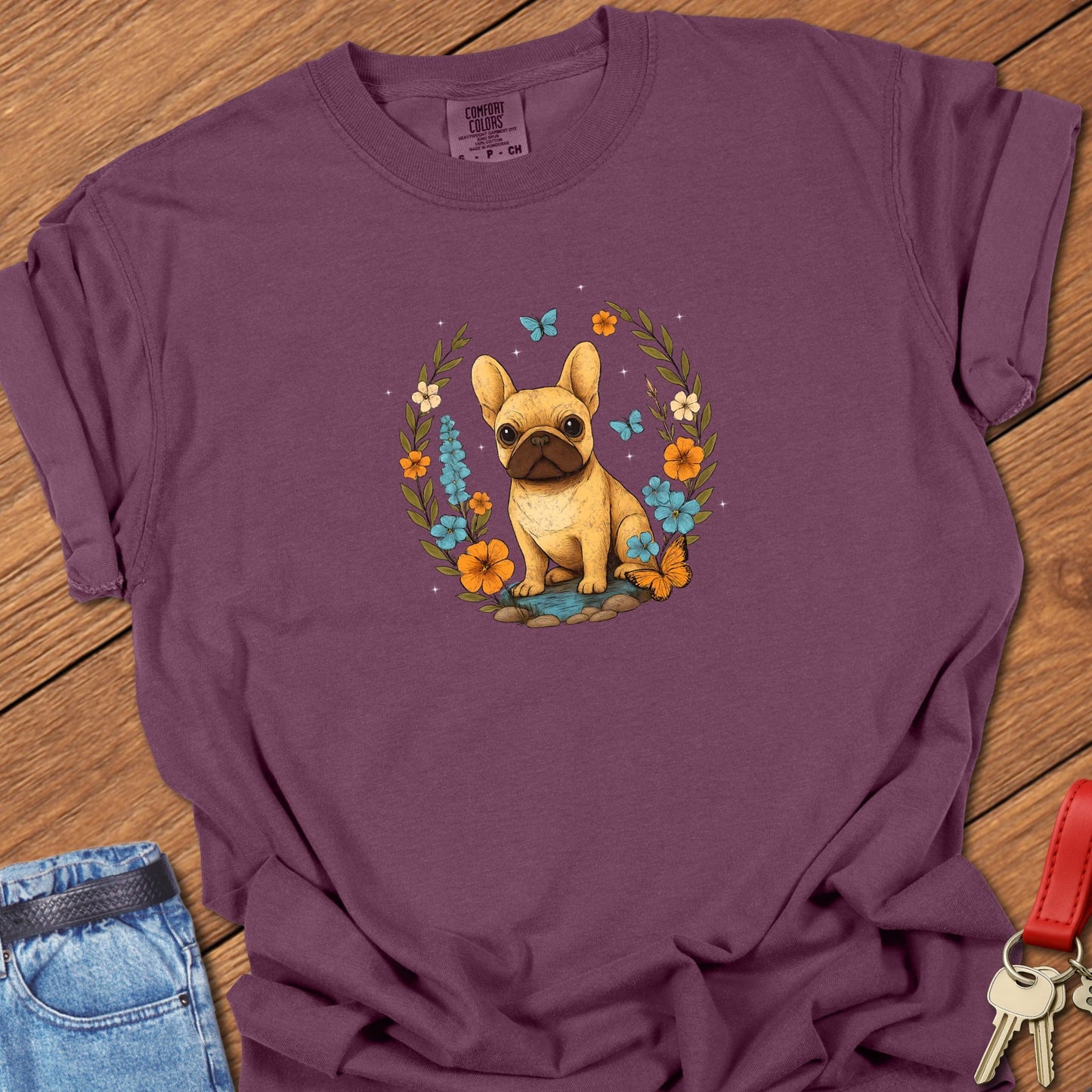 French bulldog floral wreath illustration with butterflies and wildflowers printed on berry Comfort Colors t shirt