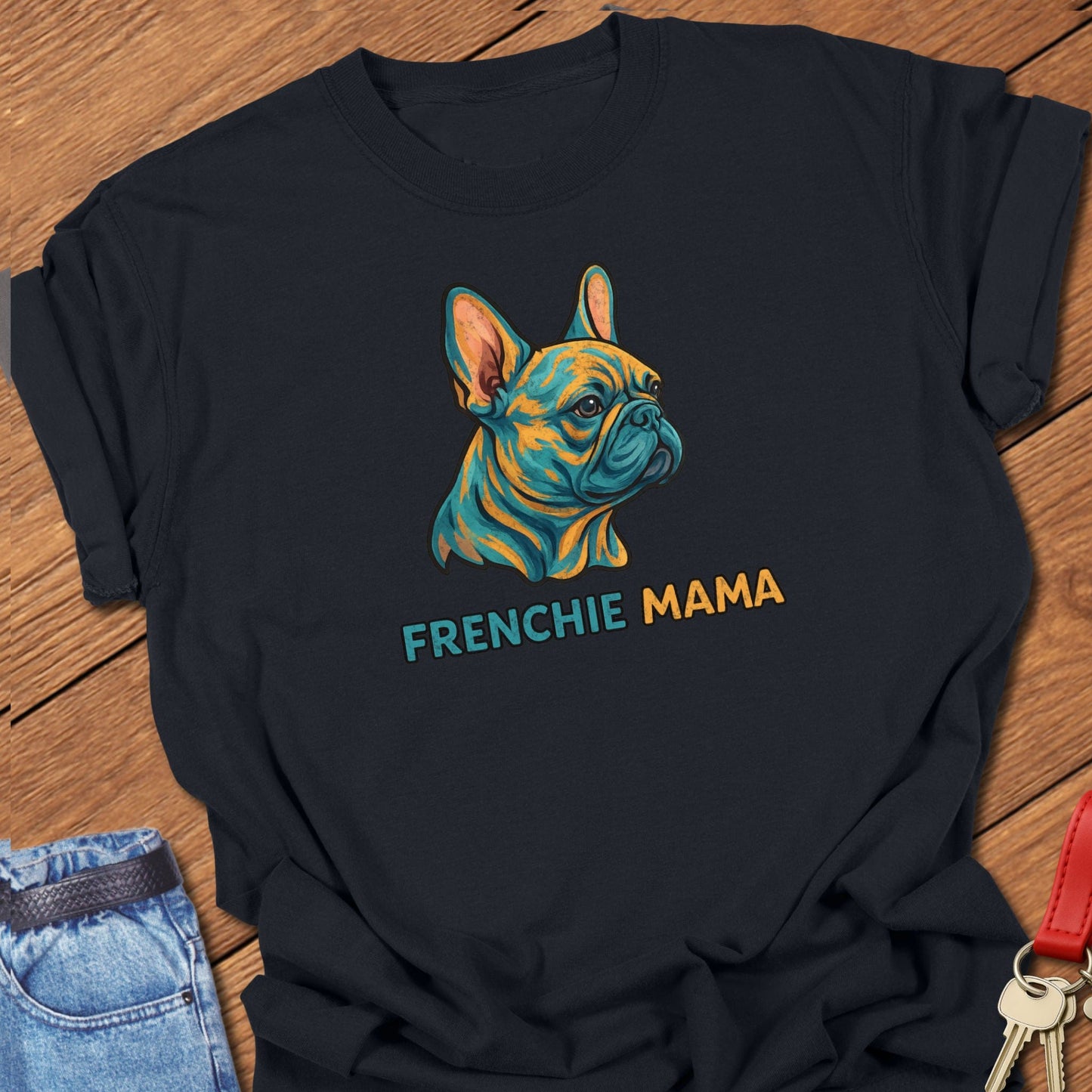 French bulldog colorful illustrated head with bold “Frenchie Mama” text printed on black Comfort Colors t shirt
