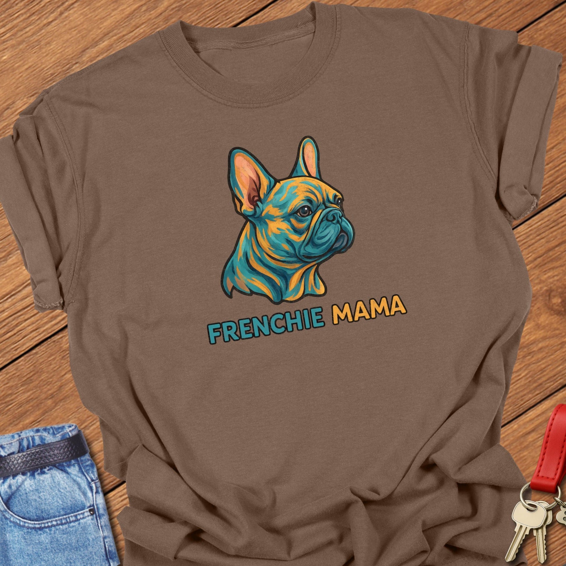 French bulldog colorful illustrated head with bold “Frenchie Mama” text printed on espresso Comfort Colors t shirt