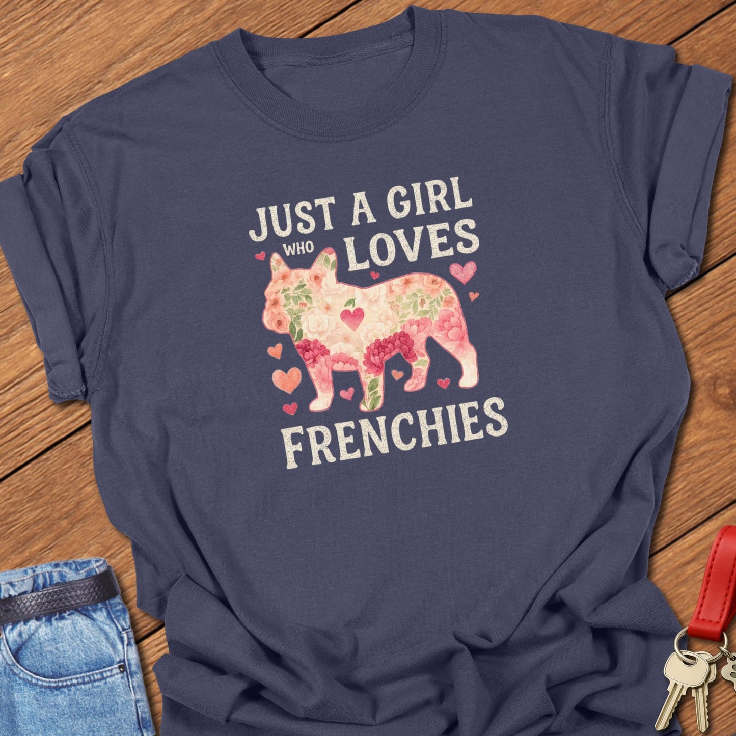 French bulldog floral silhouette with “Just a Girl Who Loves Frenchies” typography printed on navy Comfort Colors t shirt