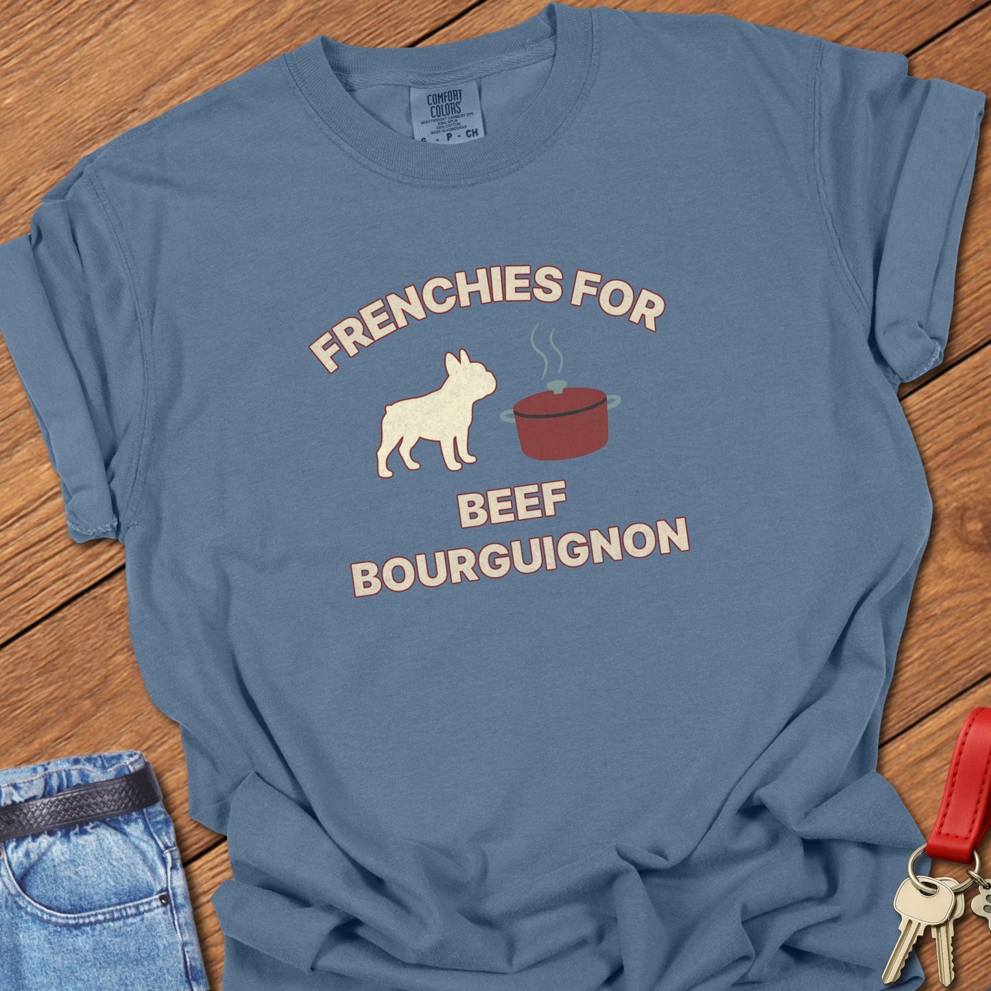 French bulldog humorous French cooking illustration with beef bourguignon pot graphic printed on blue jean Comfort Colors t shirt