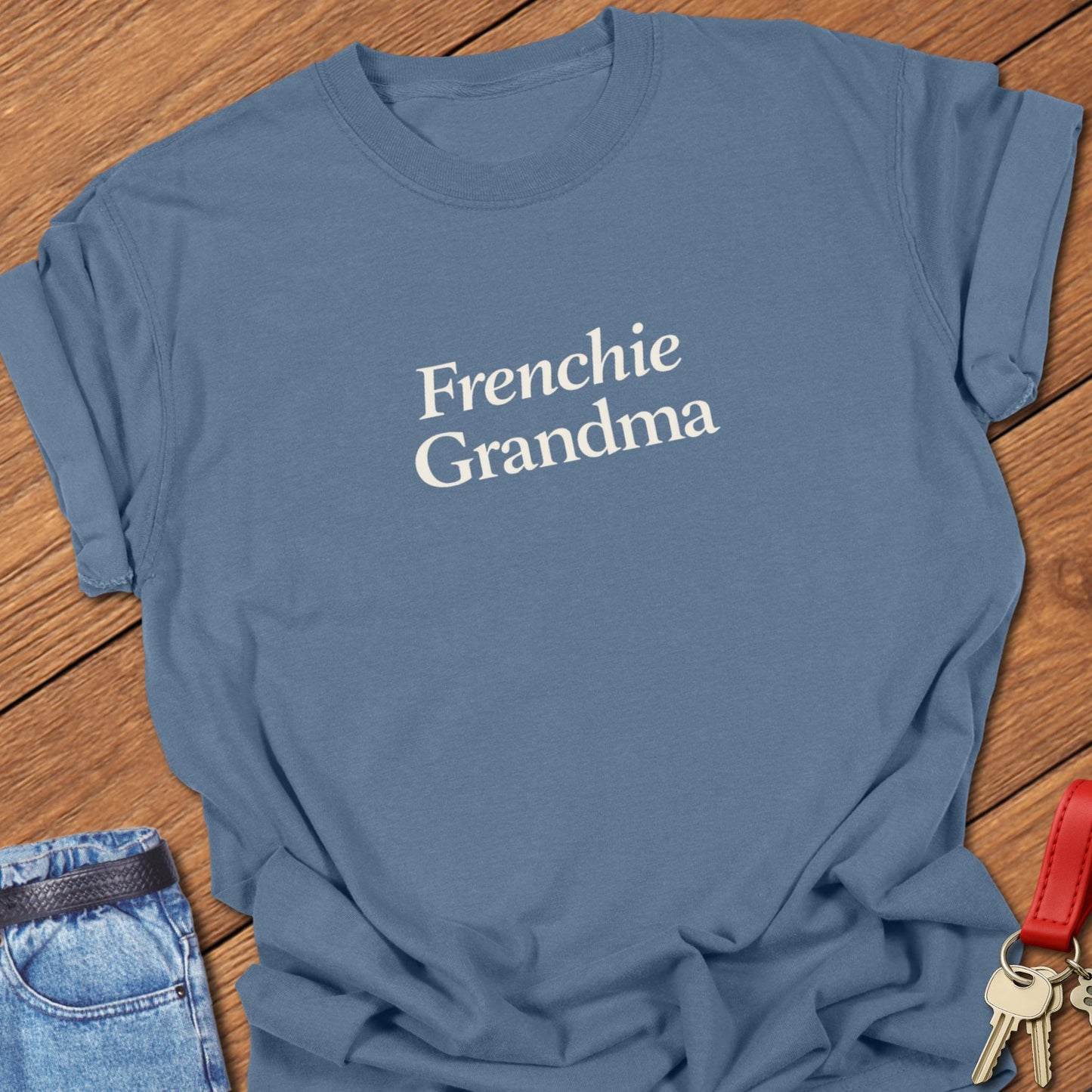 Frenchie Grandma t-shirt with minimalist black typography printed on Comfort Colors orchid garment dyed shirt in Blue Jean.