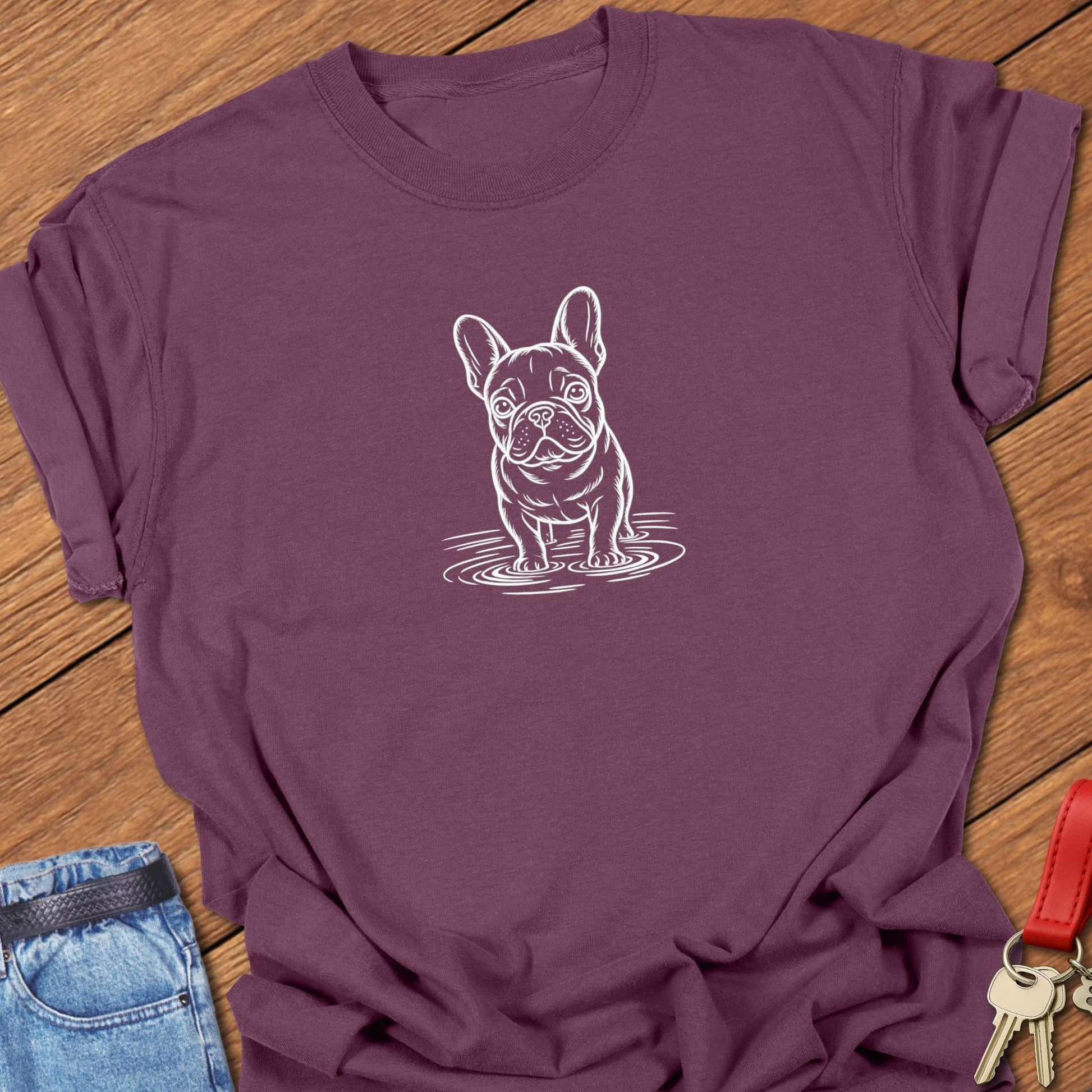 French bulldog line art standing in water graphic printed on berry Comfort Colors t shirt.