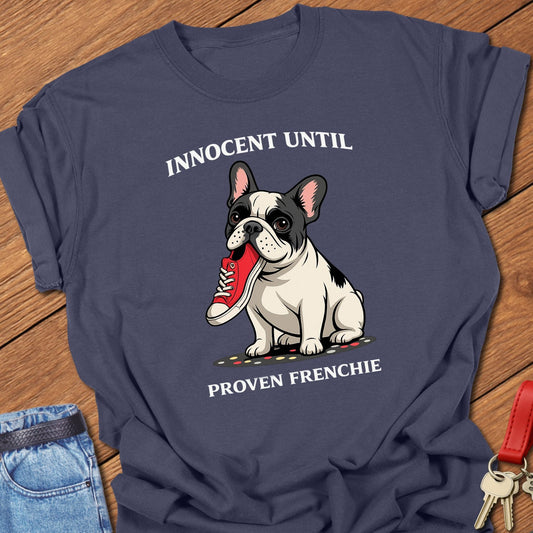 French bulldog innocent until proven frenchie cartoon graphic printed on navy Comfort Colors t shirt.