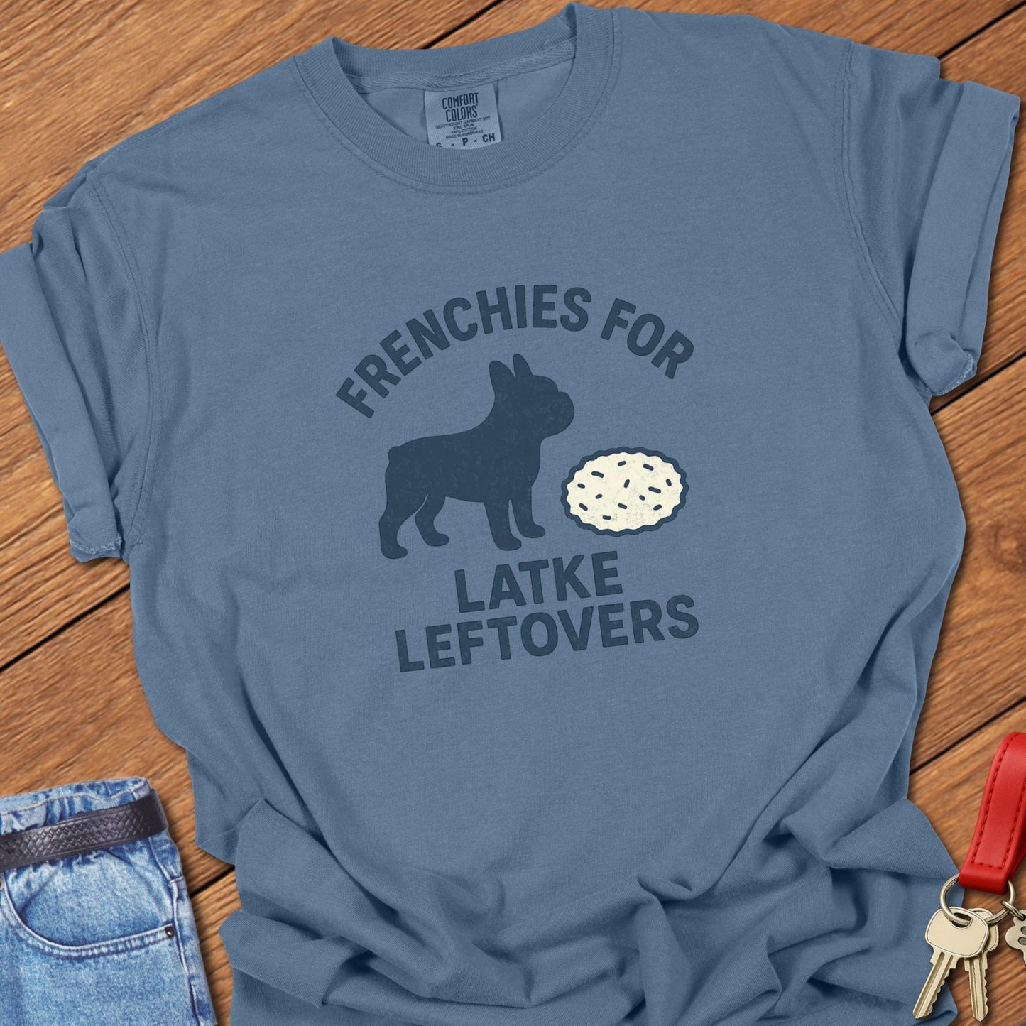 French bulldog humorous food illustration with latke graphic and playful slogan printed on blue jean Comfort Colors t shirt