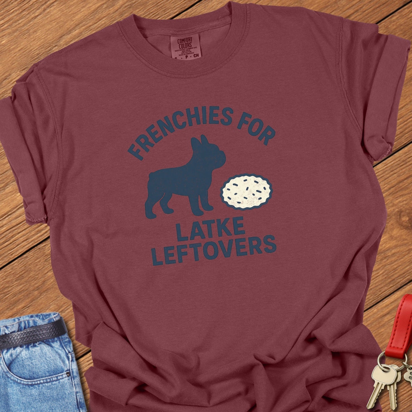 French bulldog humorous food illustration with latke graphic and playful slogan printed on brick Comfort Colors t shirt
