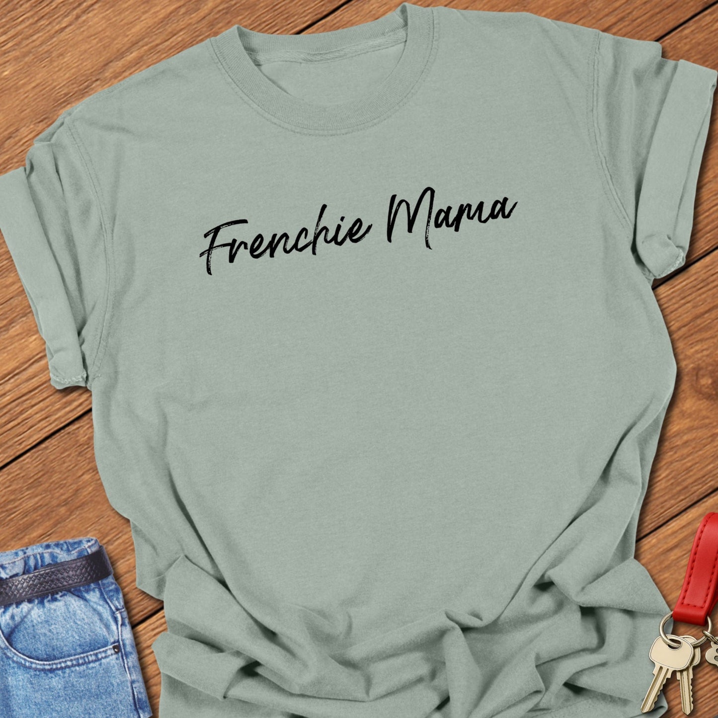French bulldog “Frenchie Mama” handwritten script text design printed on bay Comfort Colors t shirt.