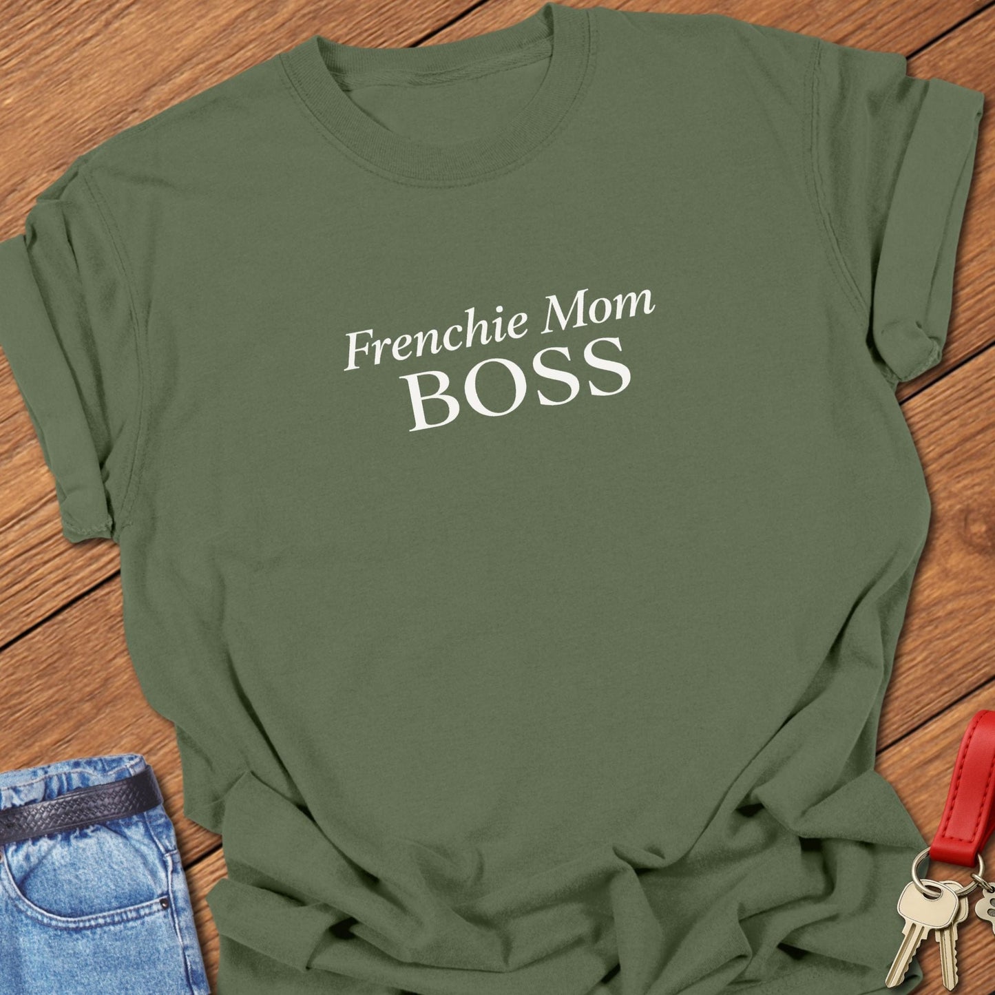 Frenchie Mom Reader text design in classic serif typography on black background minimalist French bulldog mom graphic in moss.