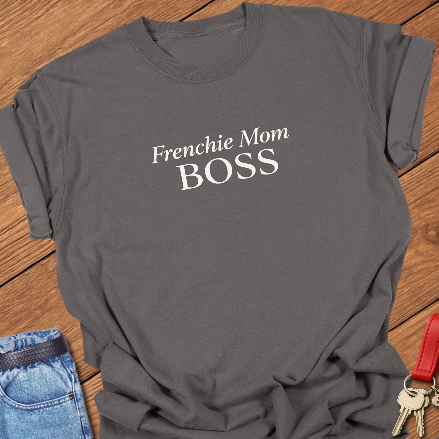 Frenchie Mom Reader text design in classic serif typography on black background minimalist French bulldog mom graphic in pepper.