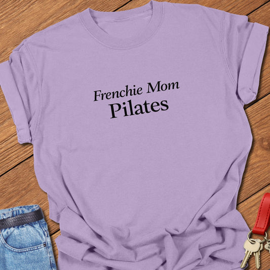 Frenchie Mom Pilates text design printed in black serif typography on a garment-dyed Comfort Colors 1717 t shirt in orchid.
