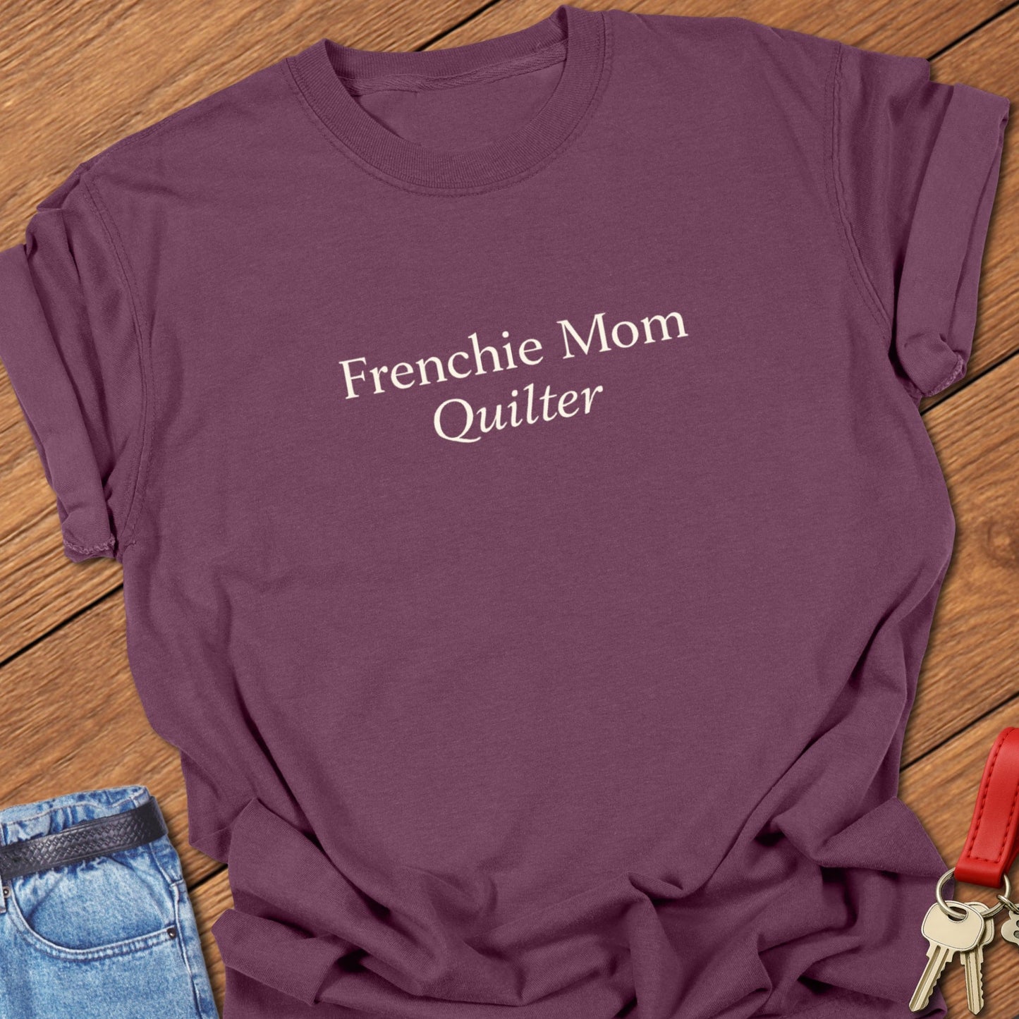 Frenchie Mom Quilter shirt with minimalist typography printed on Comfort Colors Berry T Shirt.