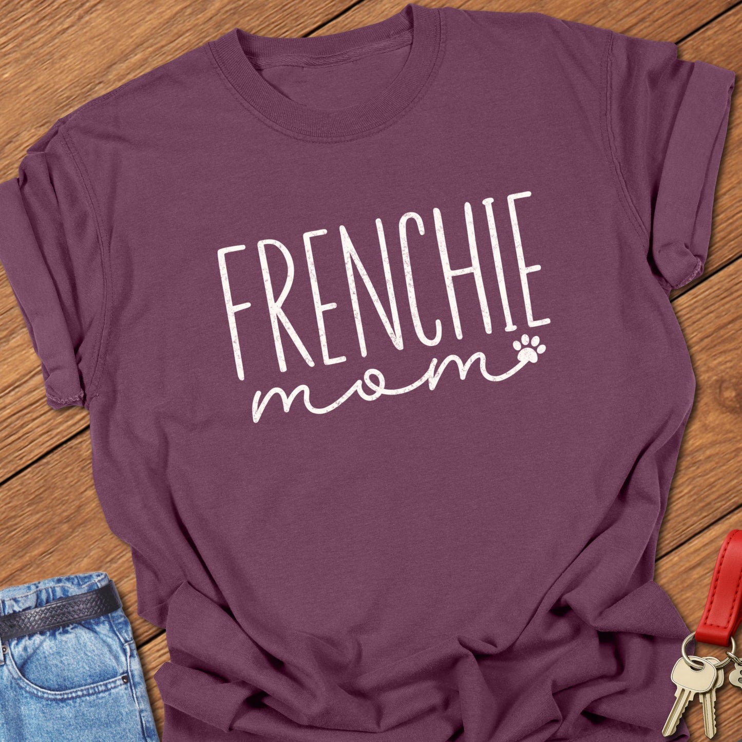 French bulldog mom script typography with paw print accent printed on berry Comfort Colors t shirt
