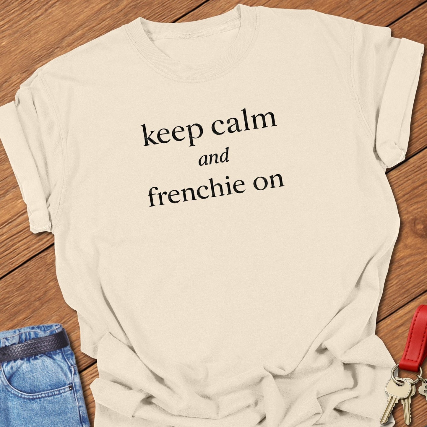 French bulldog keep calm and frenchie on text graphic printed on navy Comfort Colors t shirt.