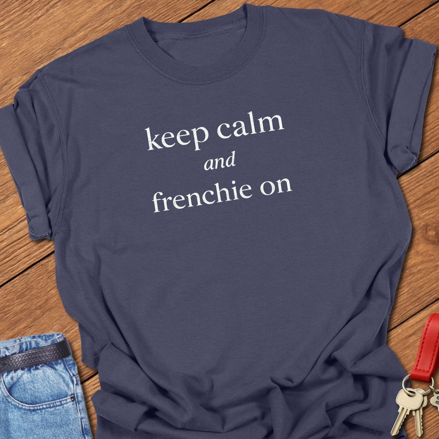 French bulldog keep calm and frenchie on text graphic printed on ivory Comfort Colors t shirt.