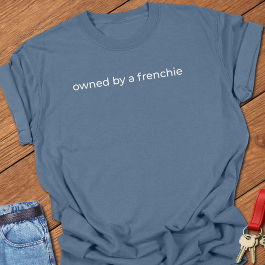 French bulldog owned by a frenchie text graphic printed on blue jean Comfort Colors t shirt.