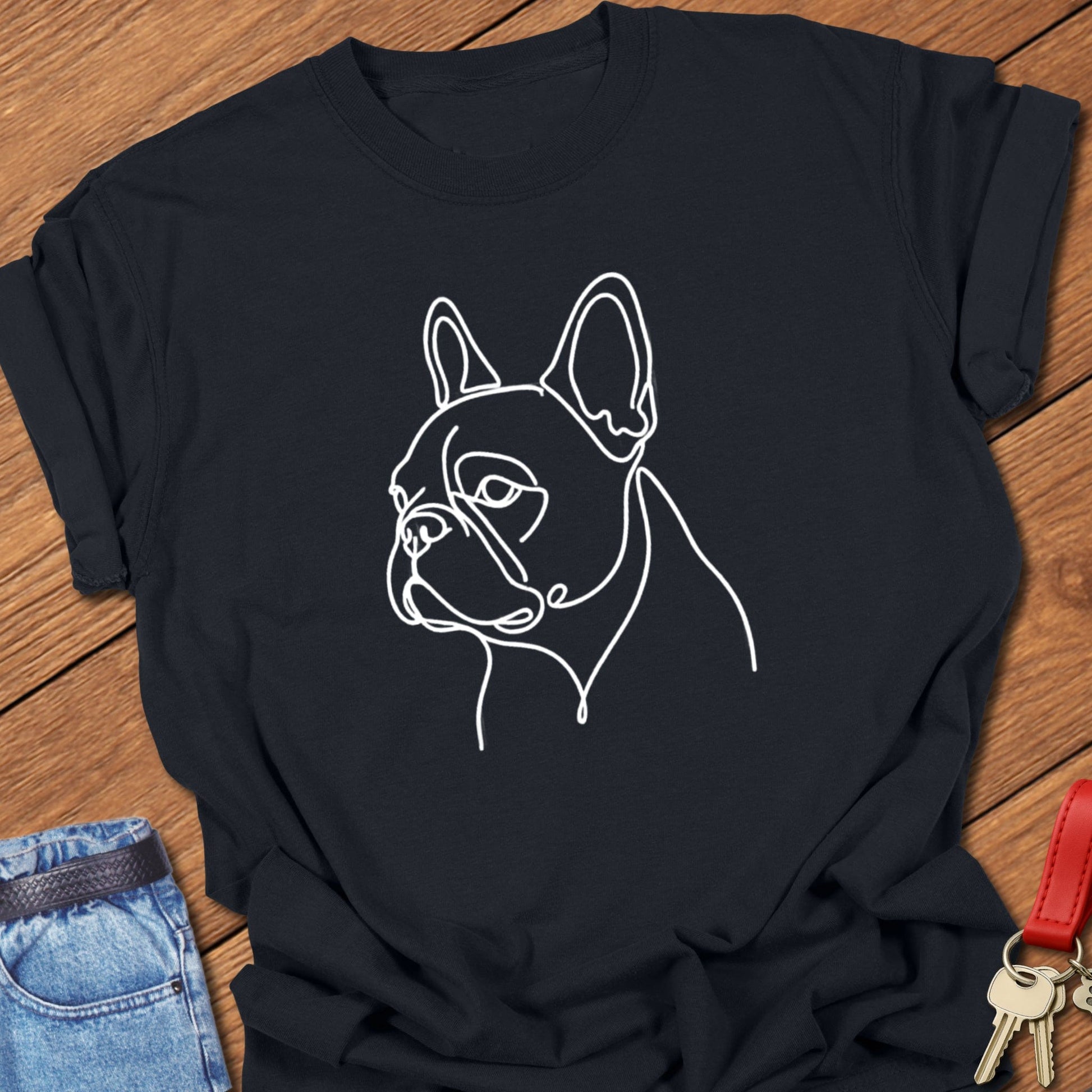 French bulldog minimalist continuous line art portrait printed on black Comfort Colors t shirt.