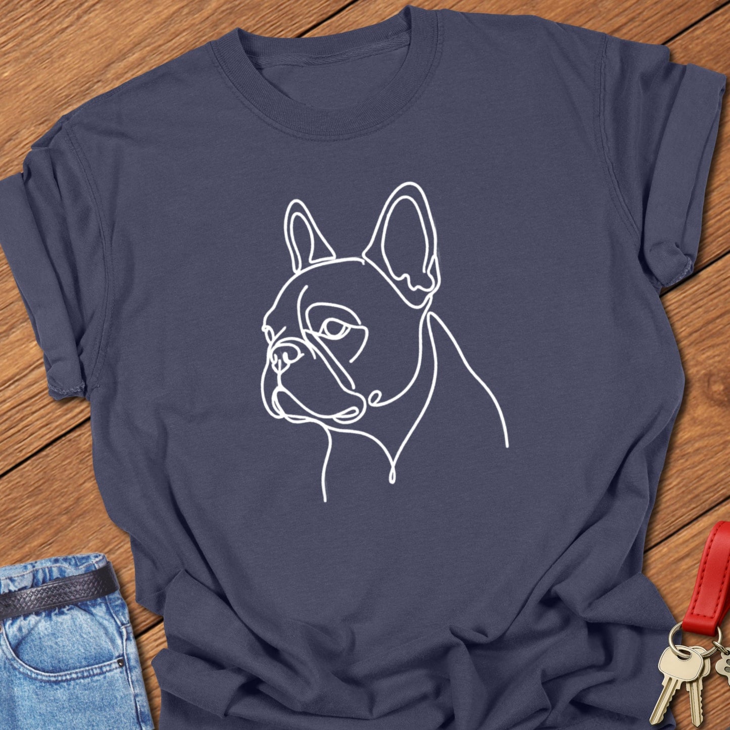 French bulldog minimalist continuous line art portrait printed on navy Comfort Colors t shirt.