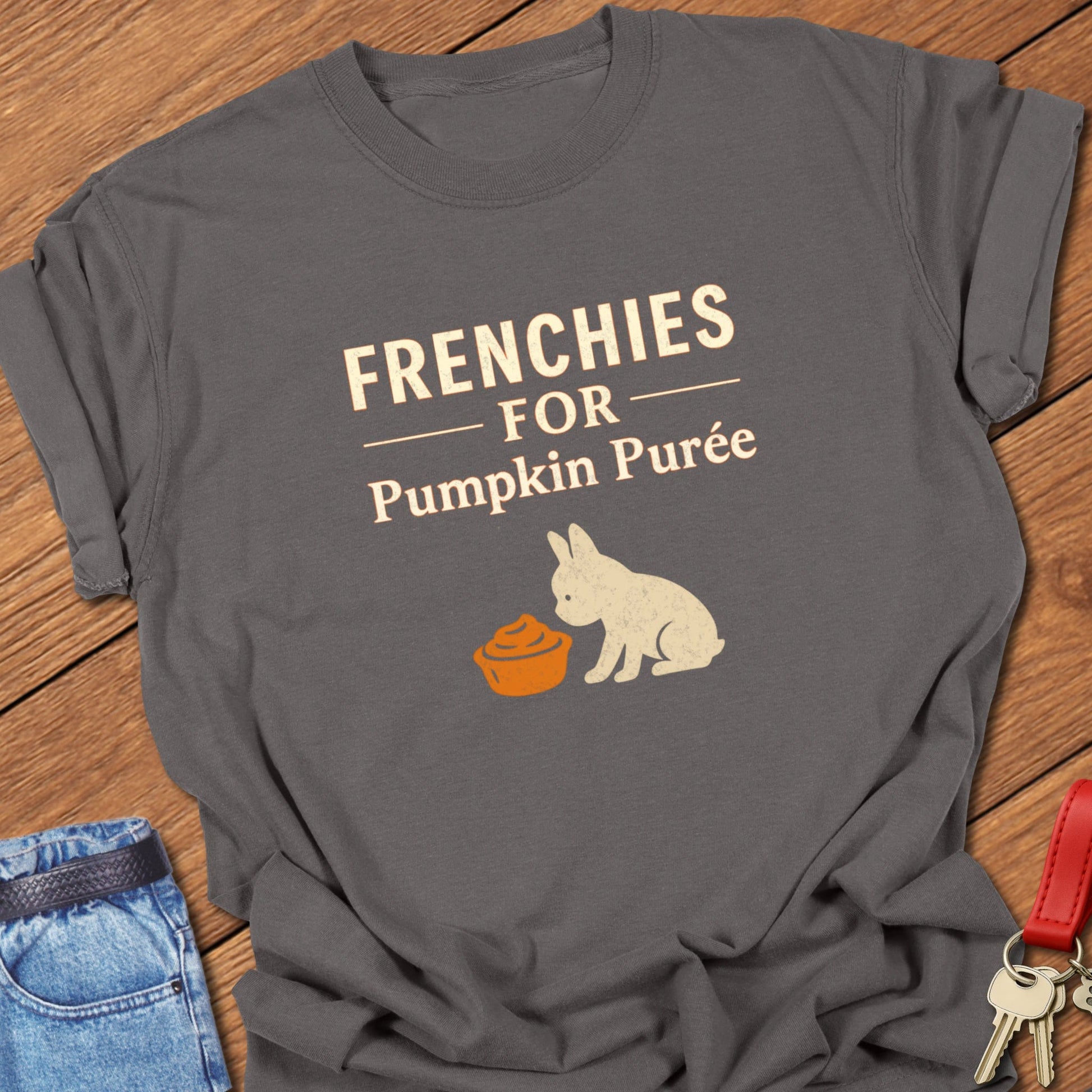 French bulldog seasonal food illustration with pumpkin purée bowl graphic and bold typography printed on pepper Comfort Colors t shirt