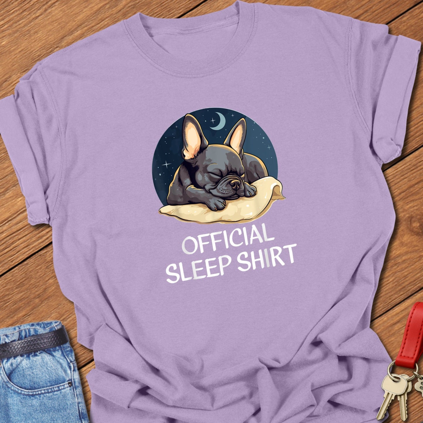 French bulldog sleeping illustration with “Official Sleep Shirt” text printed on orchid Comfort Colors t shirt