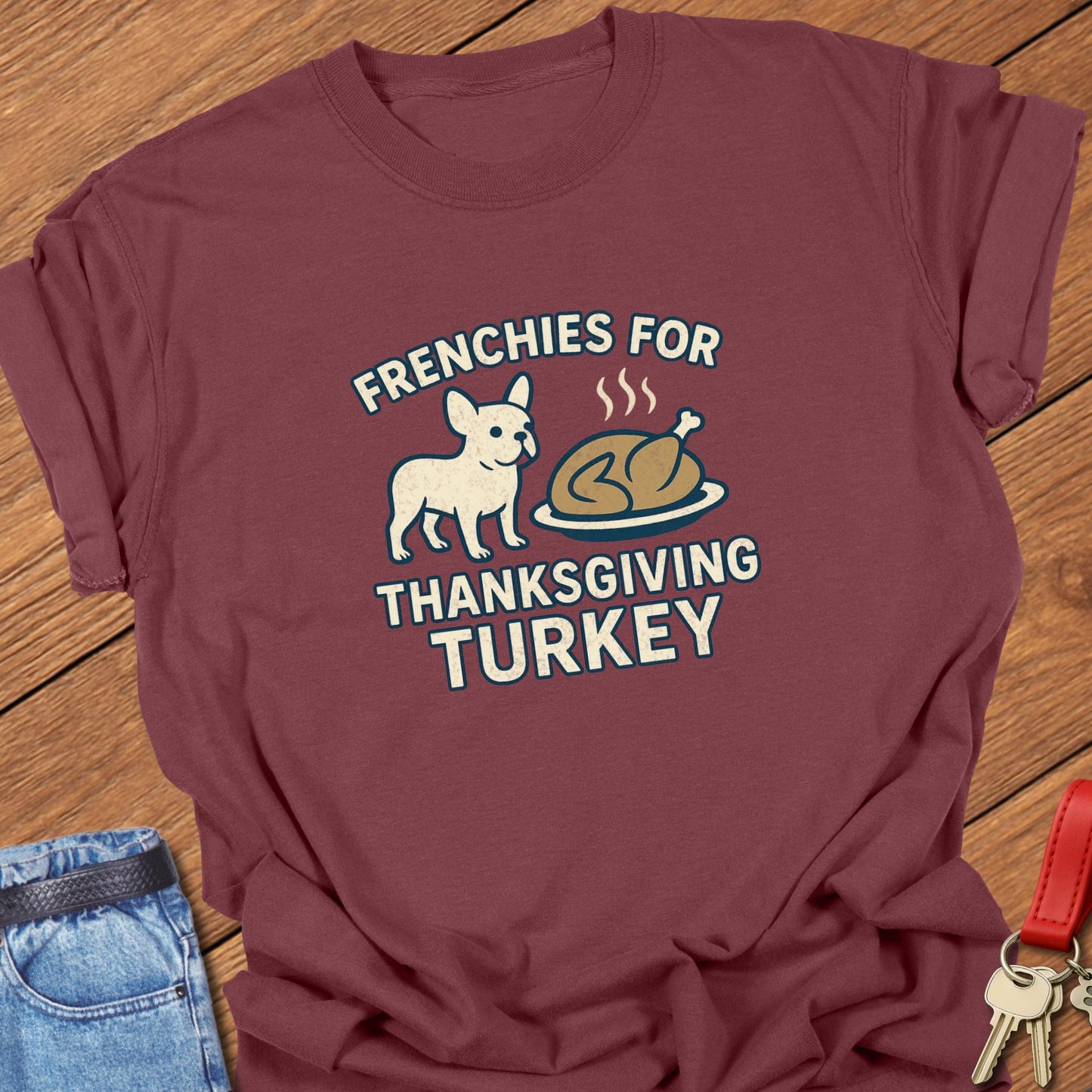French bulldog Thanksgiving illustration with cartoon Frenchie and roasted turkey graphic printed on brick Comfort Colors t shirt