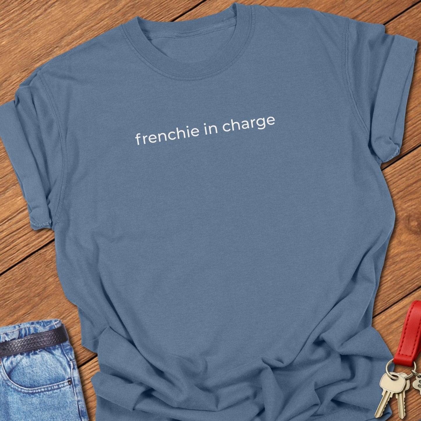 French bulldog frenchie in charge text graphic printed on blue jean Comfort Colors t shirt.