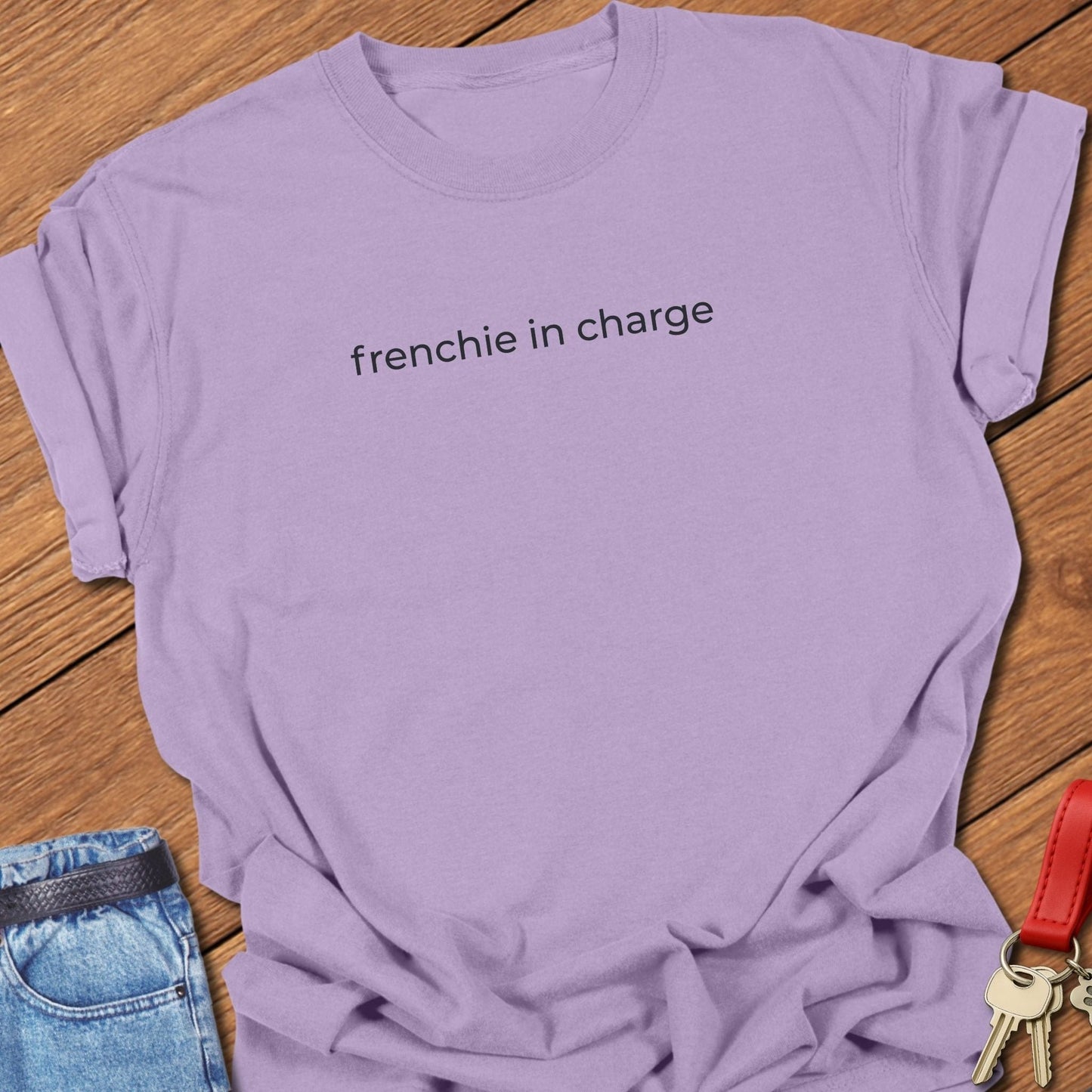 French bulldog frenchie in charge text graphic printed on orchid Comfort Colors t shirt.