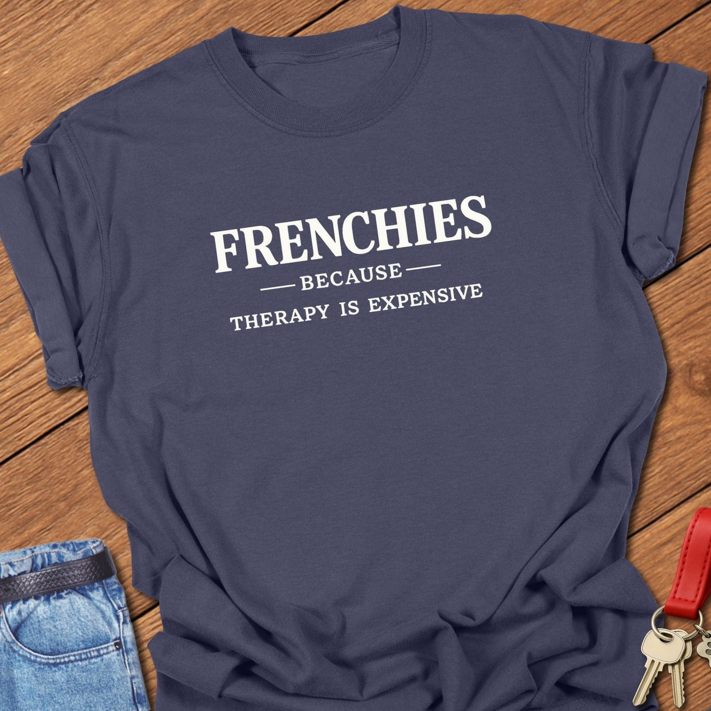 French bulldog frenchies because therapy is expensive text graphic printed on navy Comfort Colors t shirt.