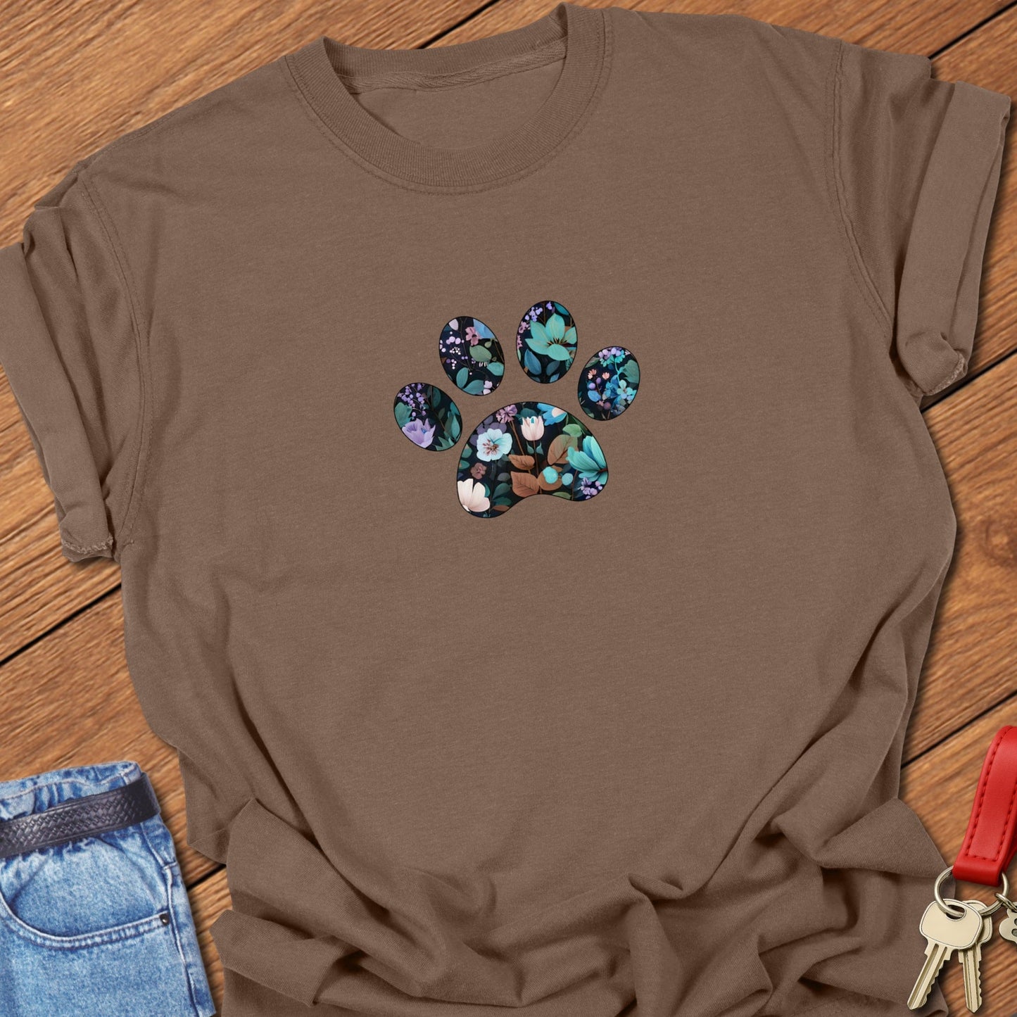 Floral paw print design featuring botanical flowers and leaves arranged inside a paw silhouette for a French Bulldog dog lover t-shirt printed on Comfort Colors garment dyed cotton in Espresso.