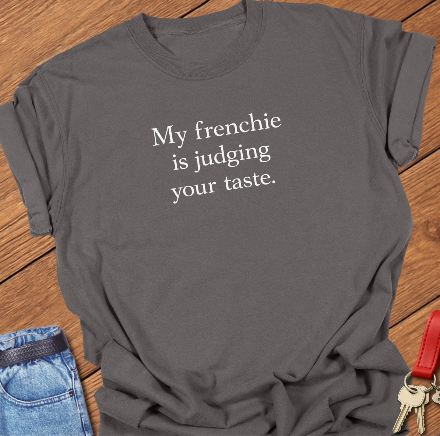 French bulldog my frenchie is judging your taste text graphic printed on pepper Comfort Colors t shirt.