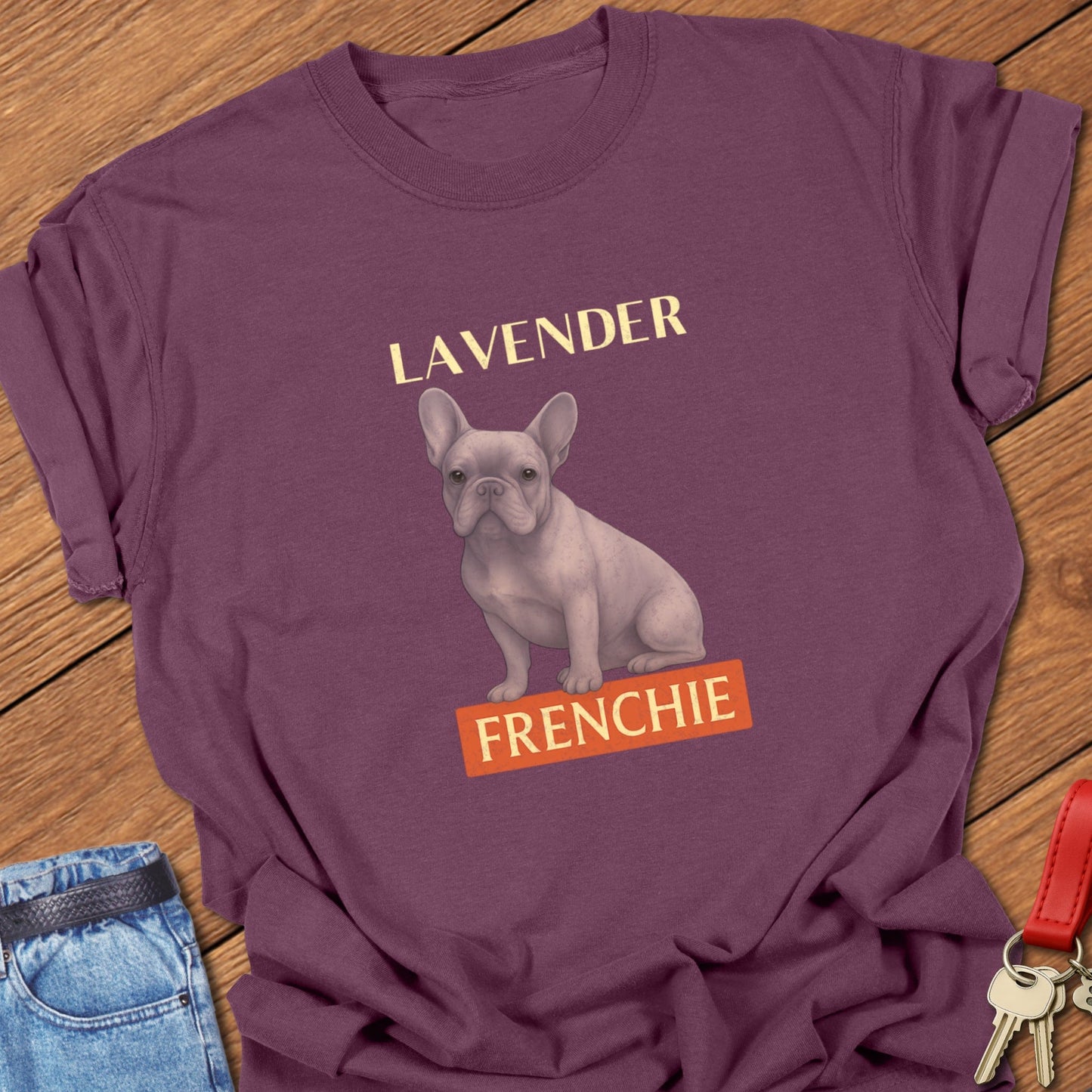 French bulldog lavender illustration with pastel Frenchie graphic and bold typography printed on berry Comfort Colors t shirt