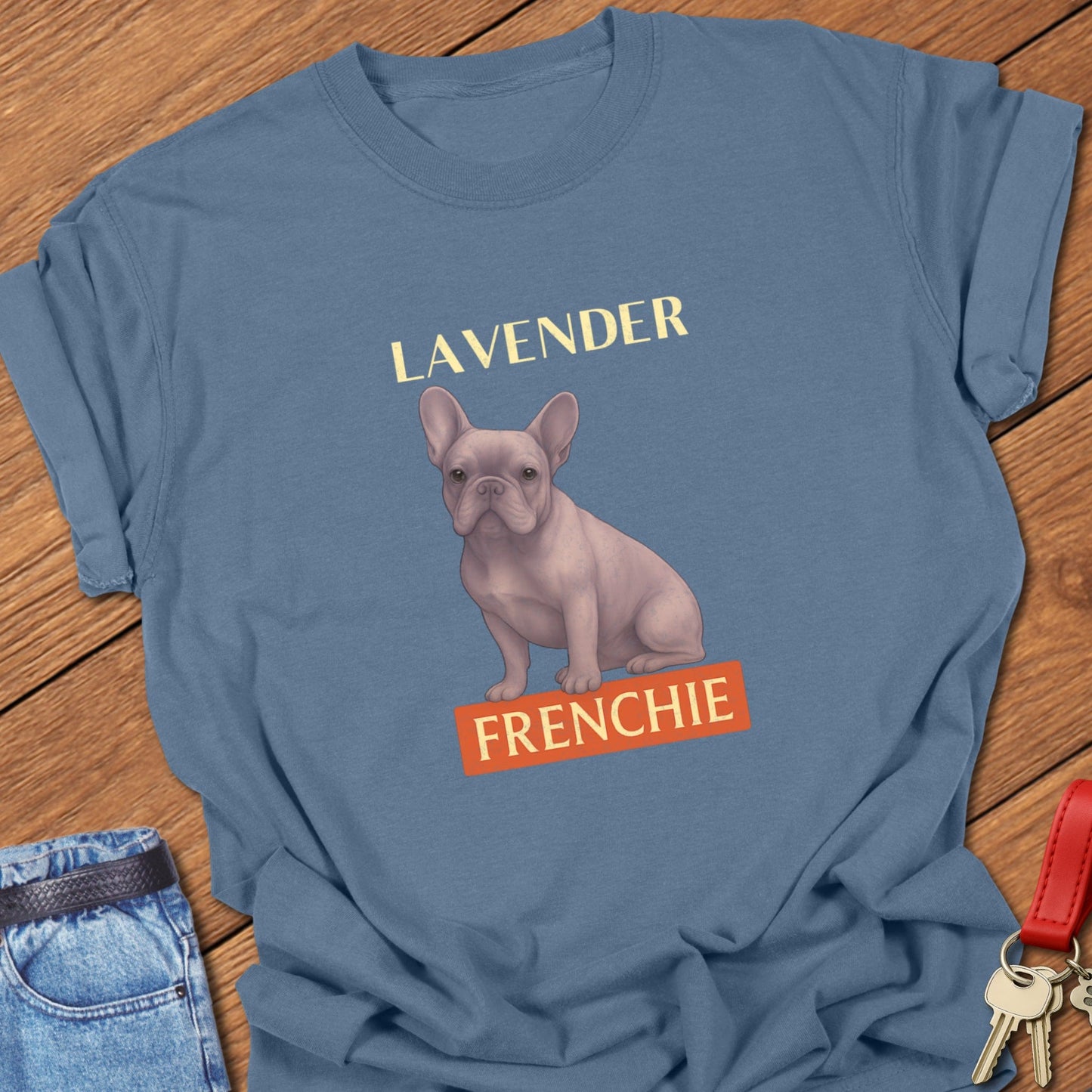 French bulldog lavender illustration with pastel Frenchie graphic and bold typography printed on blue jean Comfort Colors t shirt