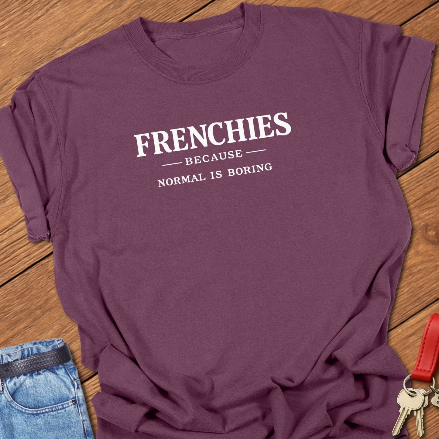 French bulldog frenchies because normal is boring text graphic printed on berry Comfort Colors t shirt.